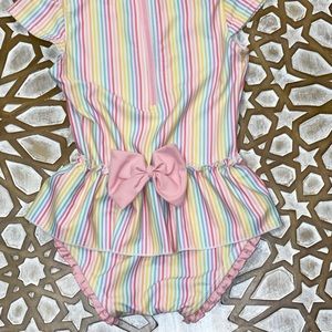Rainbow striped peplum one piece swim suit